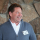 activision blizzard CEO bobby kotick standing in front of a stone wall